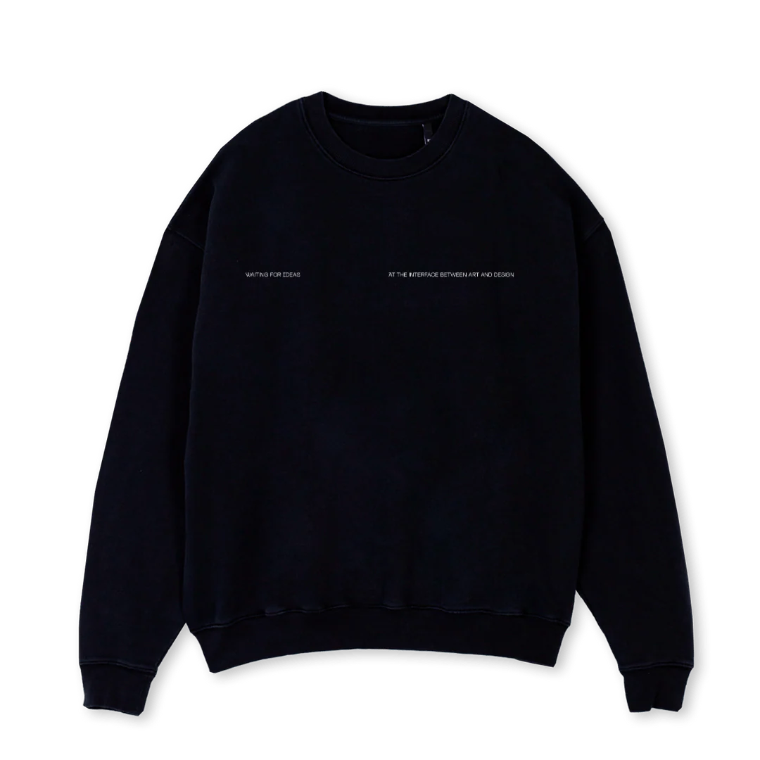 AT THE INTERFACE Black Oversized Crewneck Sweater.
