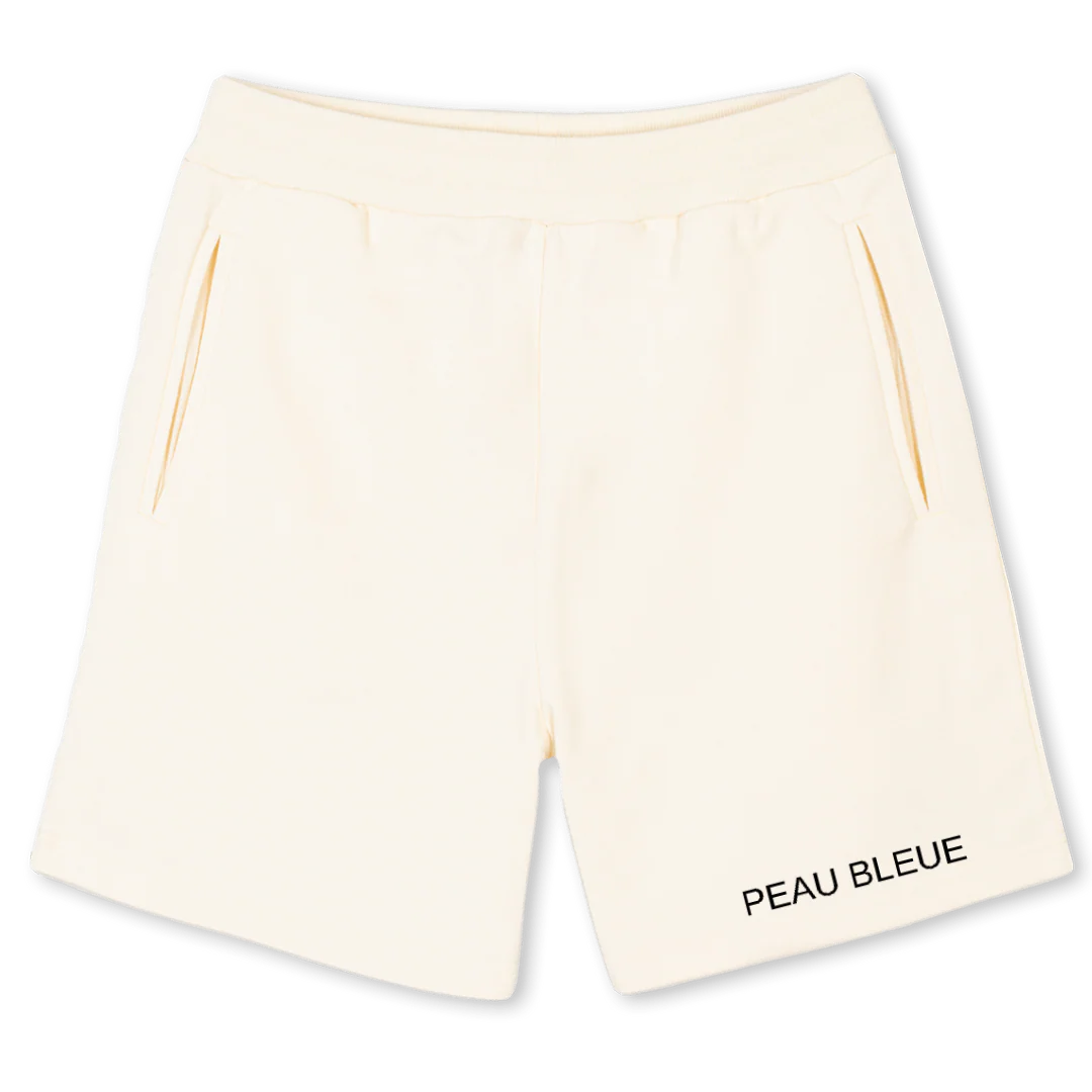 SHORTTT Cream Sweatshorts.