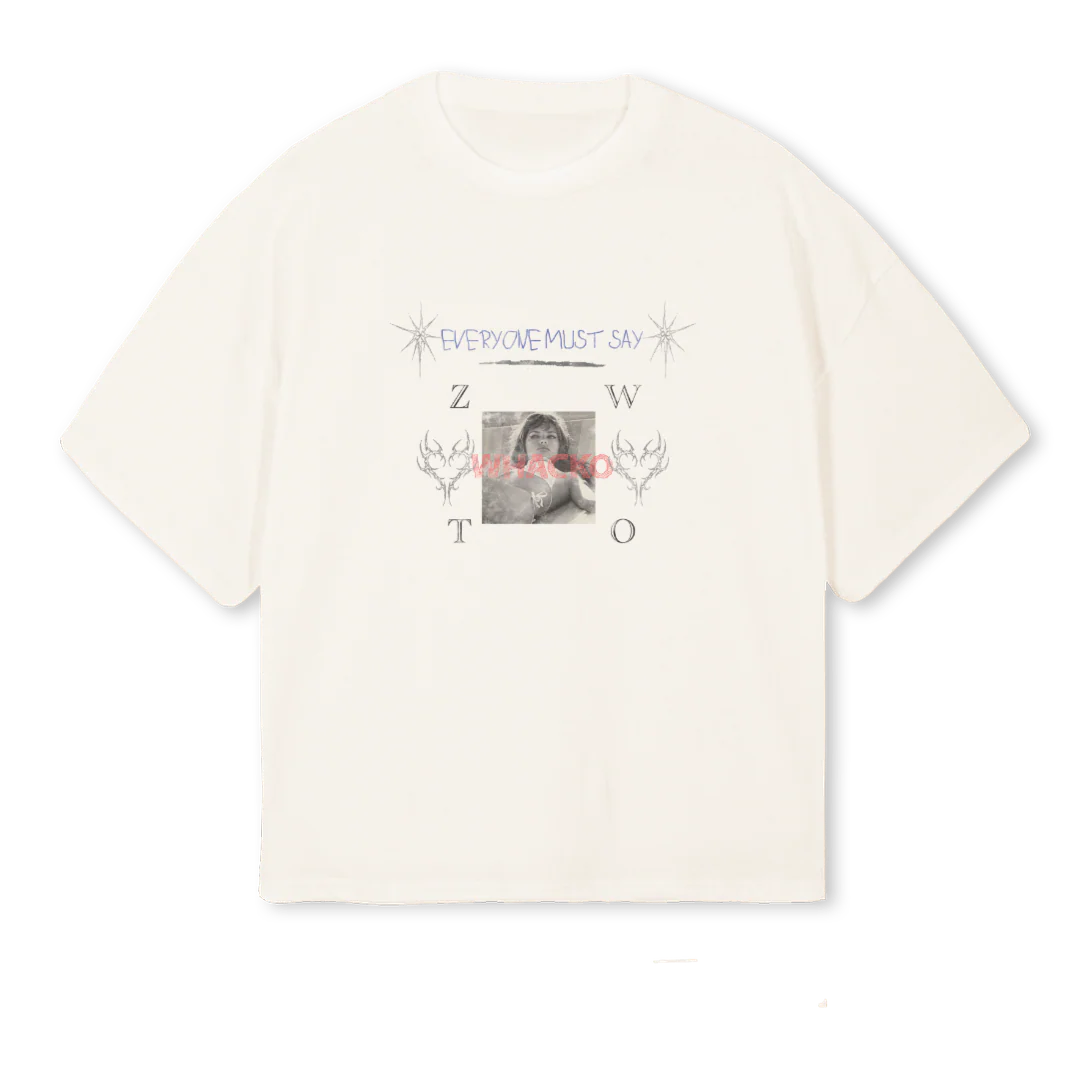 WE ALL NEED Vintage White Oversized Boxy Tee.